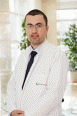 Dr. Elton Pe�i